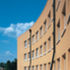 Northern façade of the business school: the northern elevations are terracotta render to relate to adjacent buildings. 
