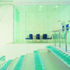 The club room enjoys views of the pools