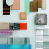 Materials board, including Cedar, Larch and Swedish Fifth Fir timber elements, as well as translucent wall overcladding in raspberry red and sky blue