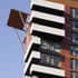 Corner balconies and projecting canopy
