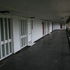 A typical deck and front doors of flats and maisonettes