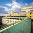 A loggia runs at roof level