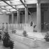 The main lobby seen from the consular side, looking over the travertine-lined pool and fountain towards the lifts and lift-lobby Diffused daylight enters by way of plastic-screened lay-lights in the inerstices of the diagrid