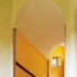 The board-marked concrete barrel vault of the staircase