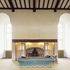 The inglenook fireplace is a dominant feature of the hall