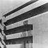 Cantilevered walkways and escape staircase running along the front facade