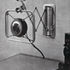 Extensible and swivelling microphone wall fitting