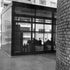 View through pump house to flat block beyond