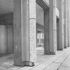 T shaped columns with continuing aluminium trim and portland stone rib facing