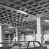 Car park showing concrete ceiling and supporting pillars