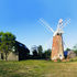 Building and windmill