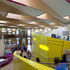 A balcony used as circulation overlooks the main central space, combining the two stories into one whole
