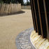 Detail - Fins, concrete upstand, metal grating, responding to organic lines of landscape design