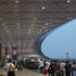 Sheltering under the extended roof canopy