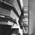 The entrance is into a tower containing the lift and main staircase, with a glazed bridge connecting each floor