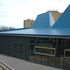 The roof is clad with bright blue Sarnafil membrane