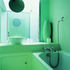 Bathrooms in Quaker Barn receive indirect light from internal glazed walls