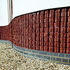 The lower level comprises three-hole engineering bricks snapped in half, with the rough face exposed pointing recessed