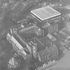 Arial view showing position alongside old university buildings