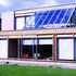 South elevation in 1967 with exposed ply vents and fascias