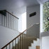Stair with steel and walnut balustrade