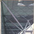 Ramp leading to station with glazed enclosure