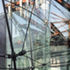 Top of atrium, where the glass wall and roof are suspended by spring fixings