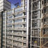 The bulk of the building consisting of concrete columns, glazed wall & ventilation ducts
