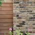 View of exterior brick and timber detail