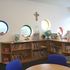 The library in use, with furniture selected by the school following completion