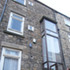 A view of rear of the property, pre-construction, with its 1960s extension 