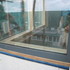 Corner windows look out on to courtyard. Glass to glass detail