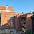 Utility and wetroom block as extension to garden wall