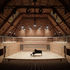 The auditorium has no acoustic treatment