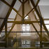 A concrete beam supports the gable wall where the flooring was removed in the penthouse flat