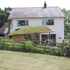 Angled roof in contrast to the existing house