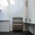 The existing chimney was opened up and used to conceal the cooker extract