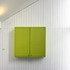 The Living room is lined in white painted timber boarding