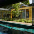 Internal swimming pool and external courtyard in summer