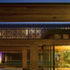 View across courtyard and bedroom wing at night