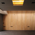 Studio showing panelled wall and gold formica skylight