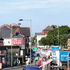 The cast concrete letters vie for attention in busy Brigstock road