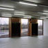 View of cabinets open onto louvred shutters