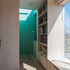 Glimpse through to the stairwell from the loft room
