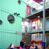 Storytelling at the stage; the decks behind connect stacks of sea containers