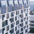The canal elevation: the terracotta cladding is topped by two zinc-clad upper floors