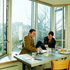 Students socialise in one of the shared kitchens