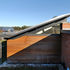 The slanted roof allows natural light through a rooflight