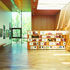 A folding wall reconciles the generosity  and ambition of the story court with the need for  more intimate space