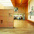 From behind the folding wall